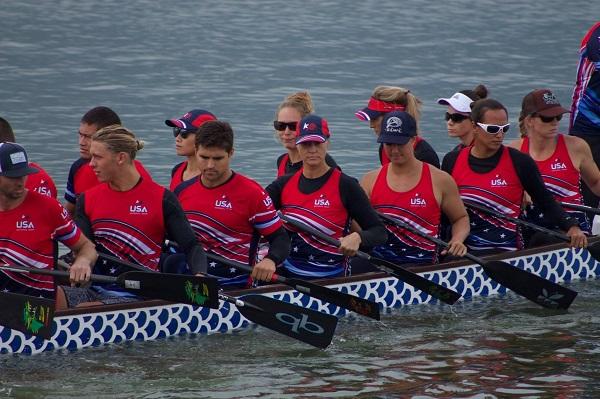Team USA Premier Mixed paddling to the start line