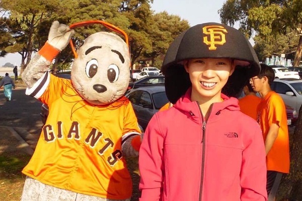 Winnie Luu with the San Francisco Giants mascot, Lou Seal