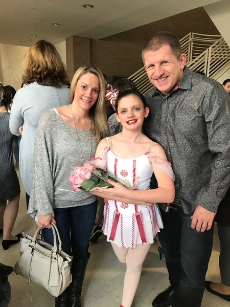 Jamie and her parents after a ballet performance