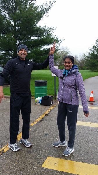 Picture of Shreaya Madireddy, community ambassador for the Asthma and Allergy Foundation of America, and her uncle Ram Nunna celebrate coming in first during a 5k run