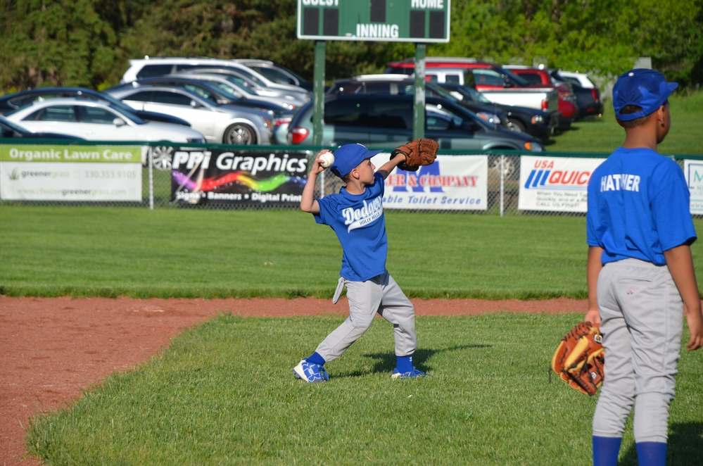 Aiden playing baseball